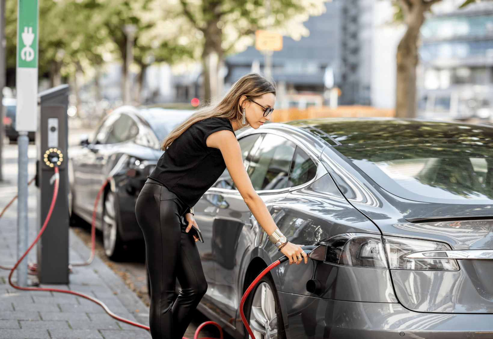 woman using electric charger